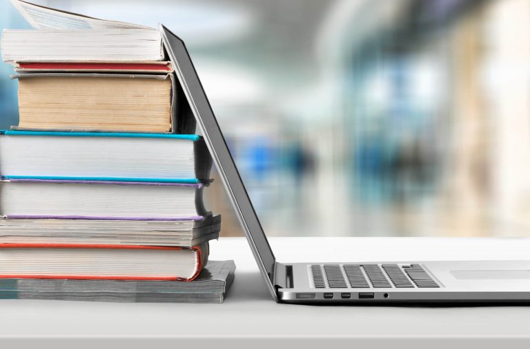 University Books and Laptop University Books and Laptop